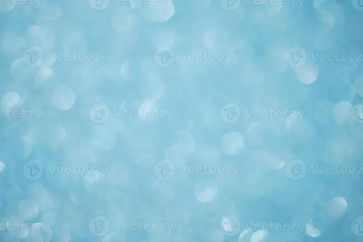 Abstract blue festive christmas background with bokeh. photo
