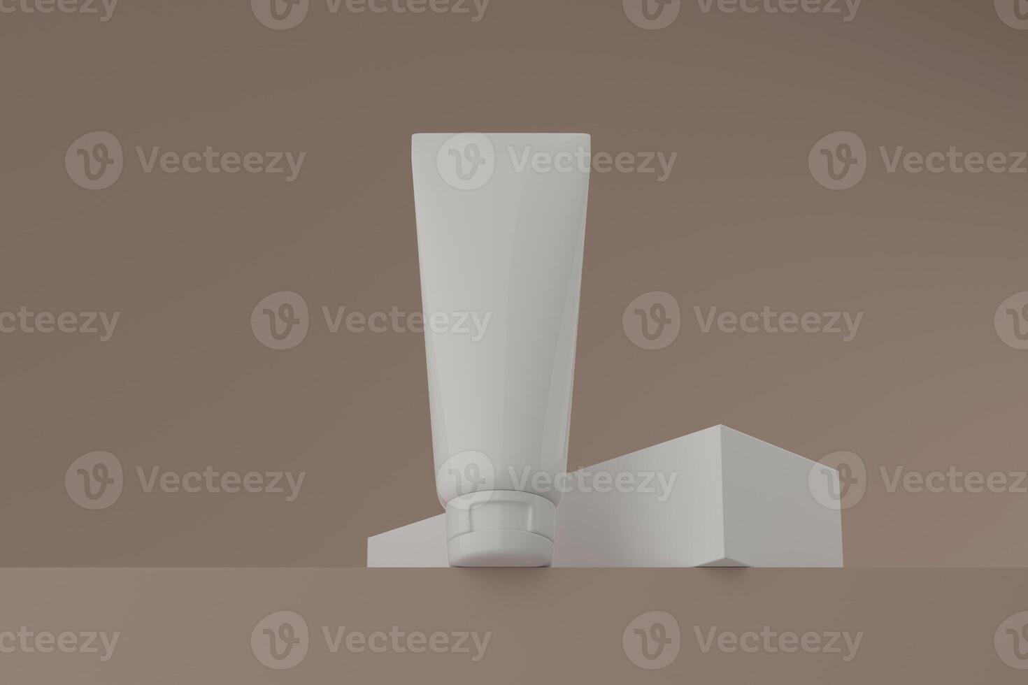 A tube of cream standing upright on a rectangular box photo