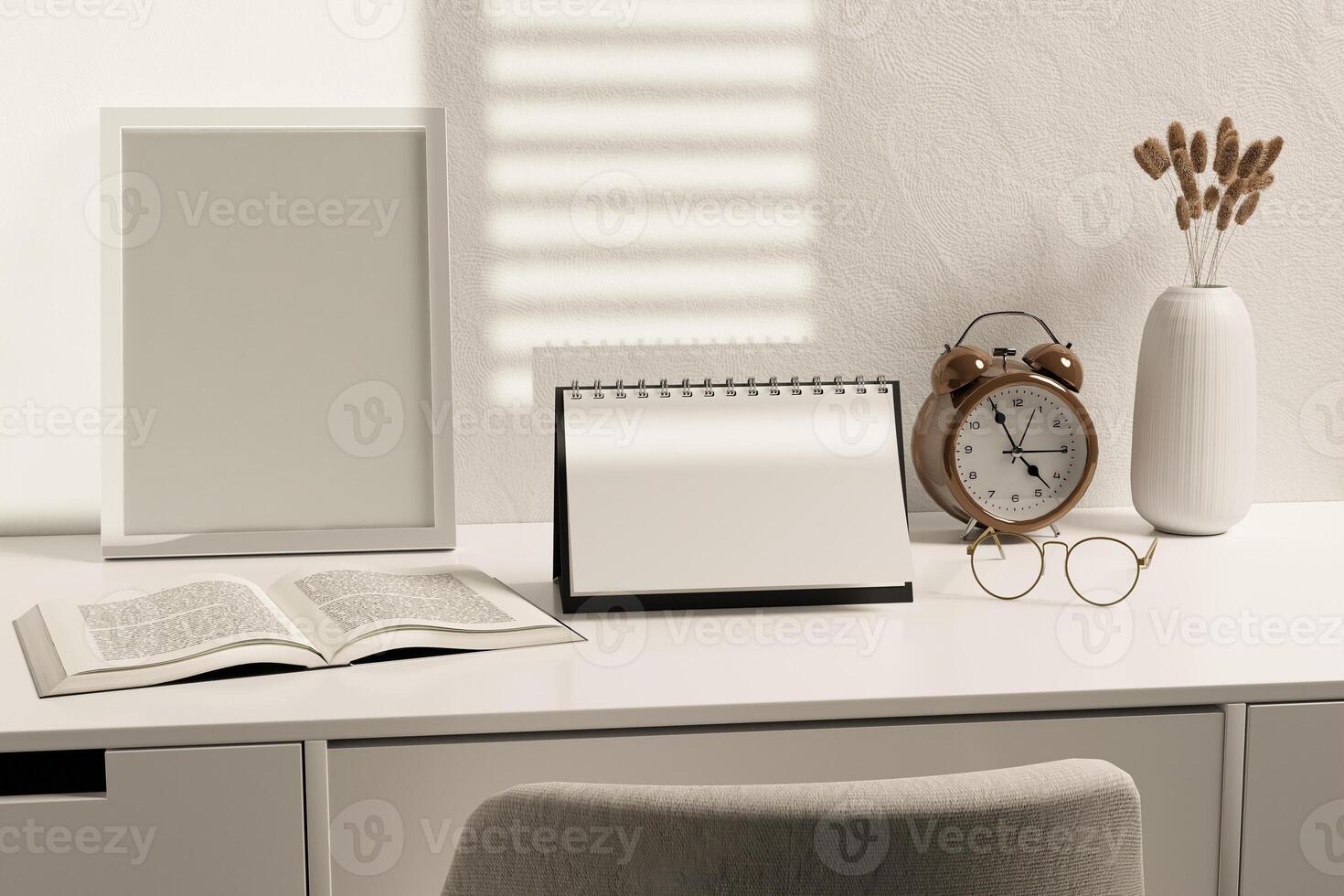 A blank desk calendar on a desk with glasses, alarm clock and a picture frame photo