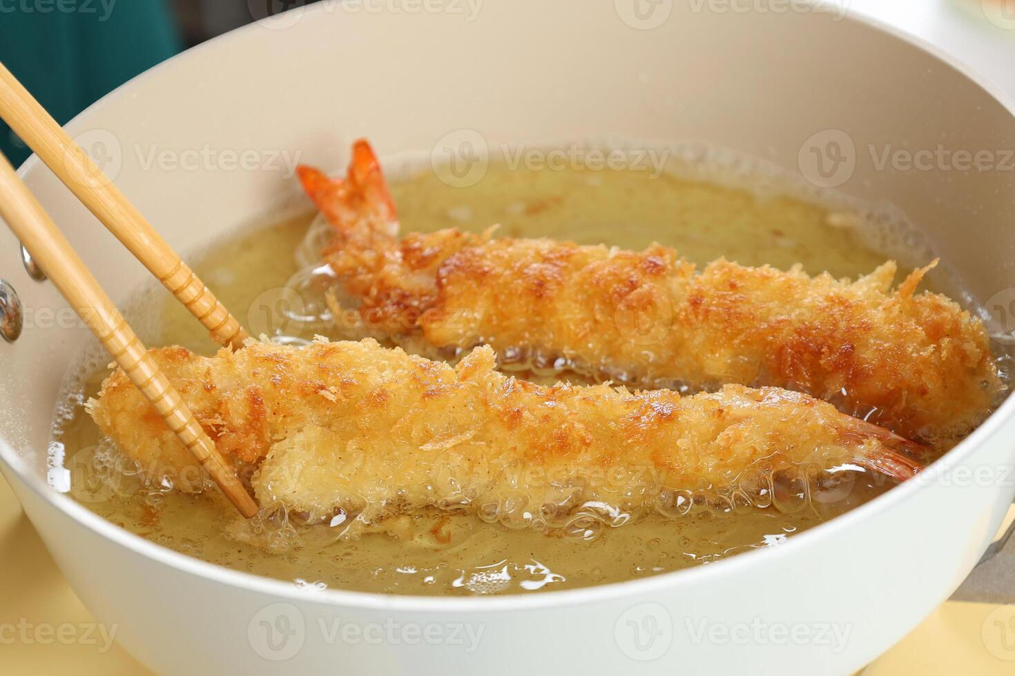 Chef Holding Chopstick Cooking Japanese Ebi Shrimp Tempura photo