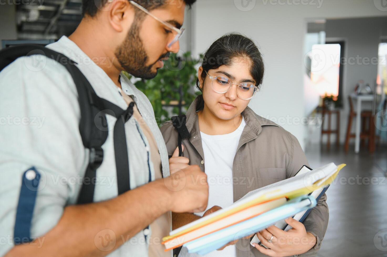 Cheerful Indian asian young college students or friends photo