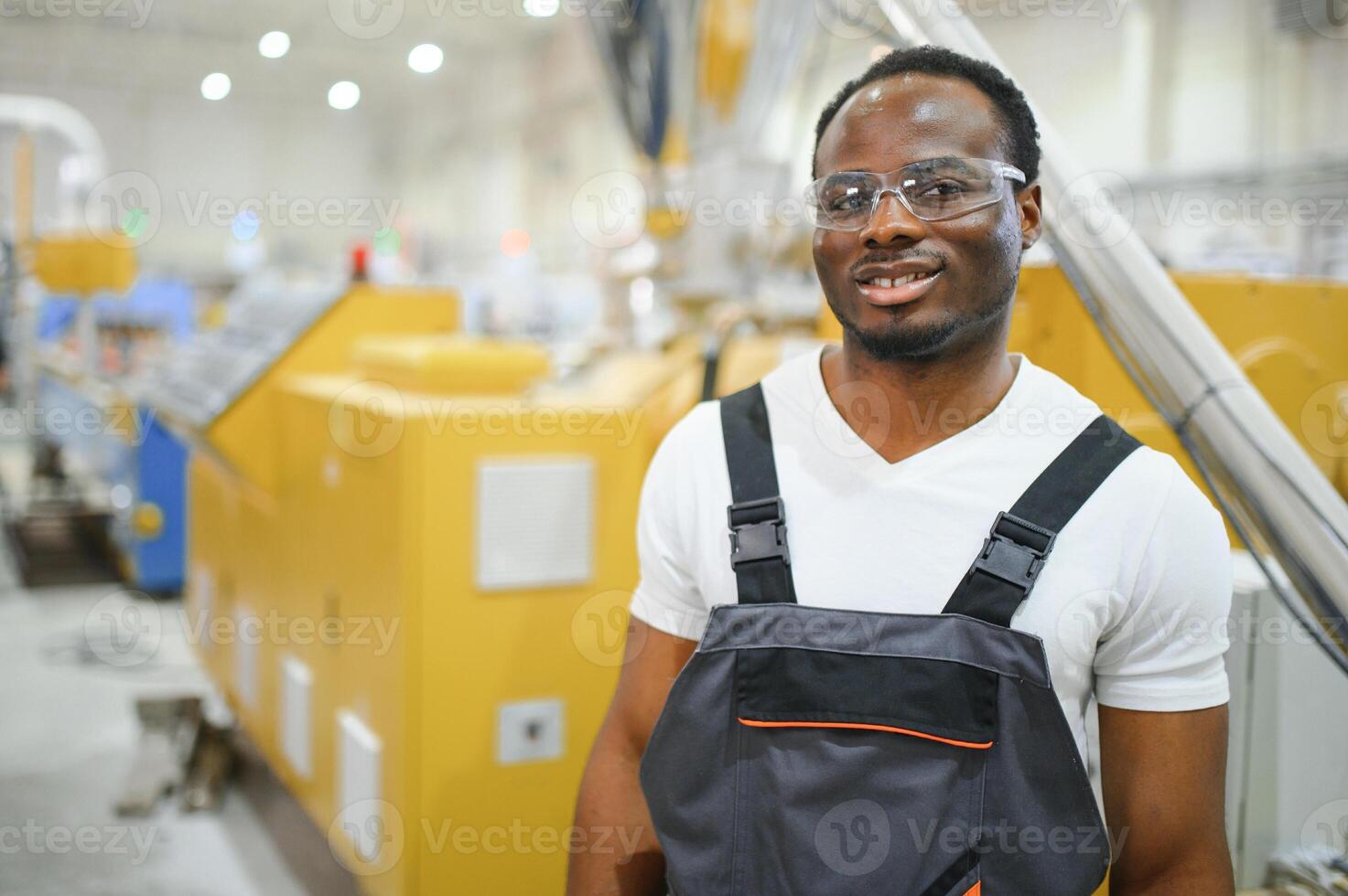 Manual worker assembling PVC doors and windows. Factory for aluminum and PVC windows and doors production photo