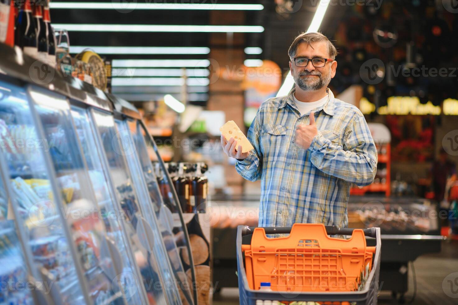 Man Holding Cheese In Front Of Grocery Store photo