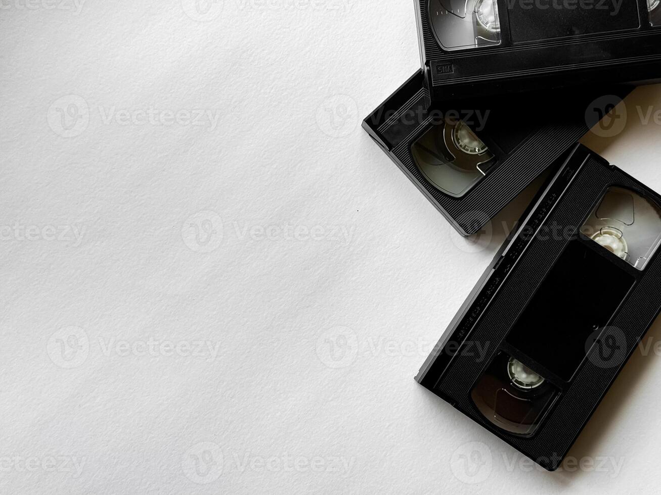 Vintage vhs cassettes on white background. nostalgic media and retro technology photo