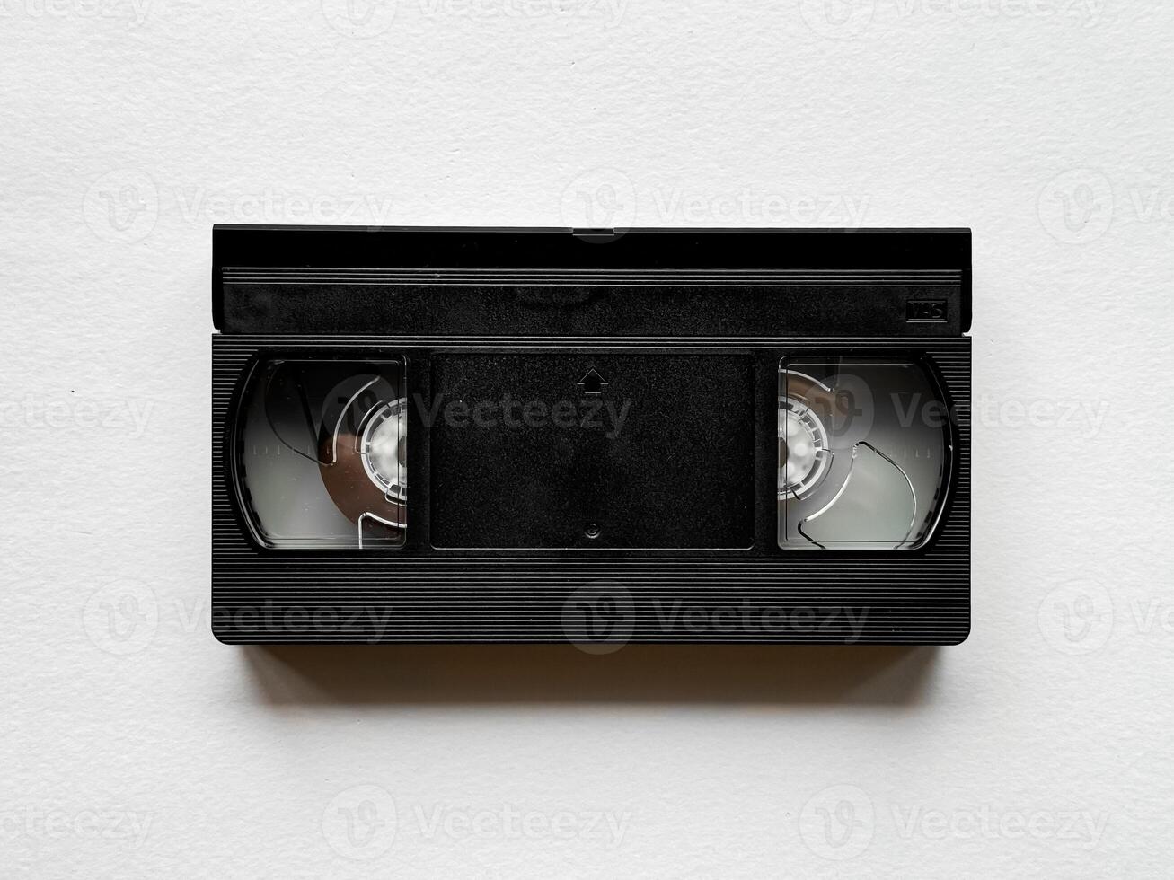 Vintage vhs cassette on plain background captures nostalgic retro technology photo