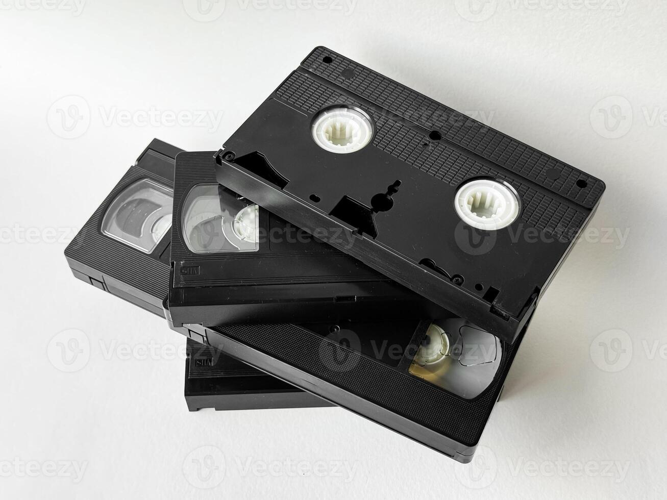 Retro vhs tapes on white background for nostalgic media themes photo