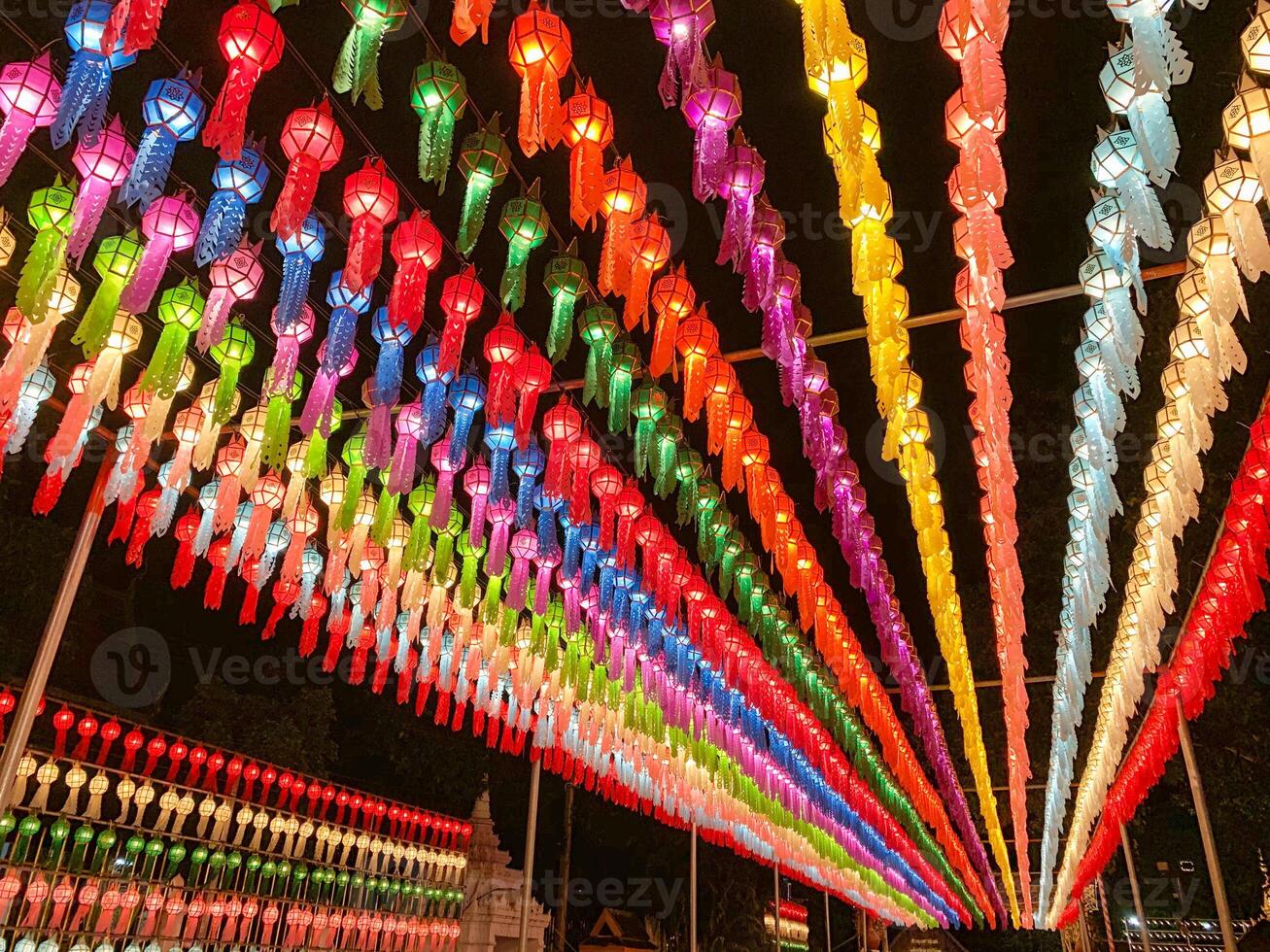 Colorful perspective view of Thai Lanna style lanterns to hang in front of the temple and turn on light at night in hundred thousand lanterns festival, Lumphun, Thailand. photo