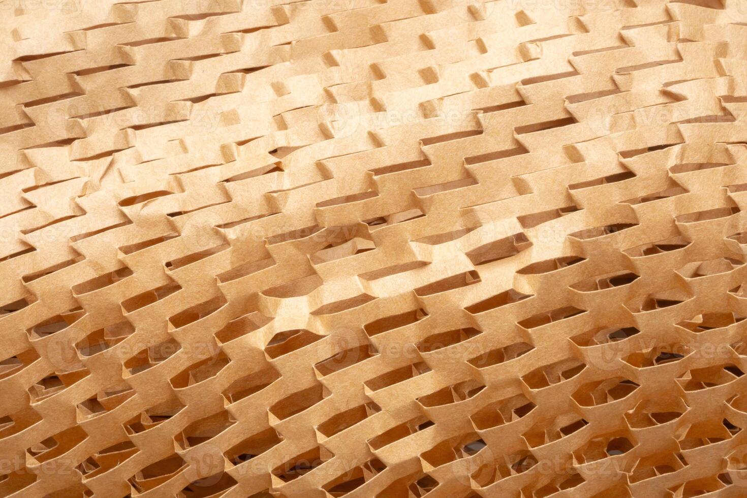 Eco friendly brown paper honeycomb texture wrap background for product packaging parcel carton box photo