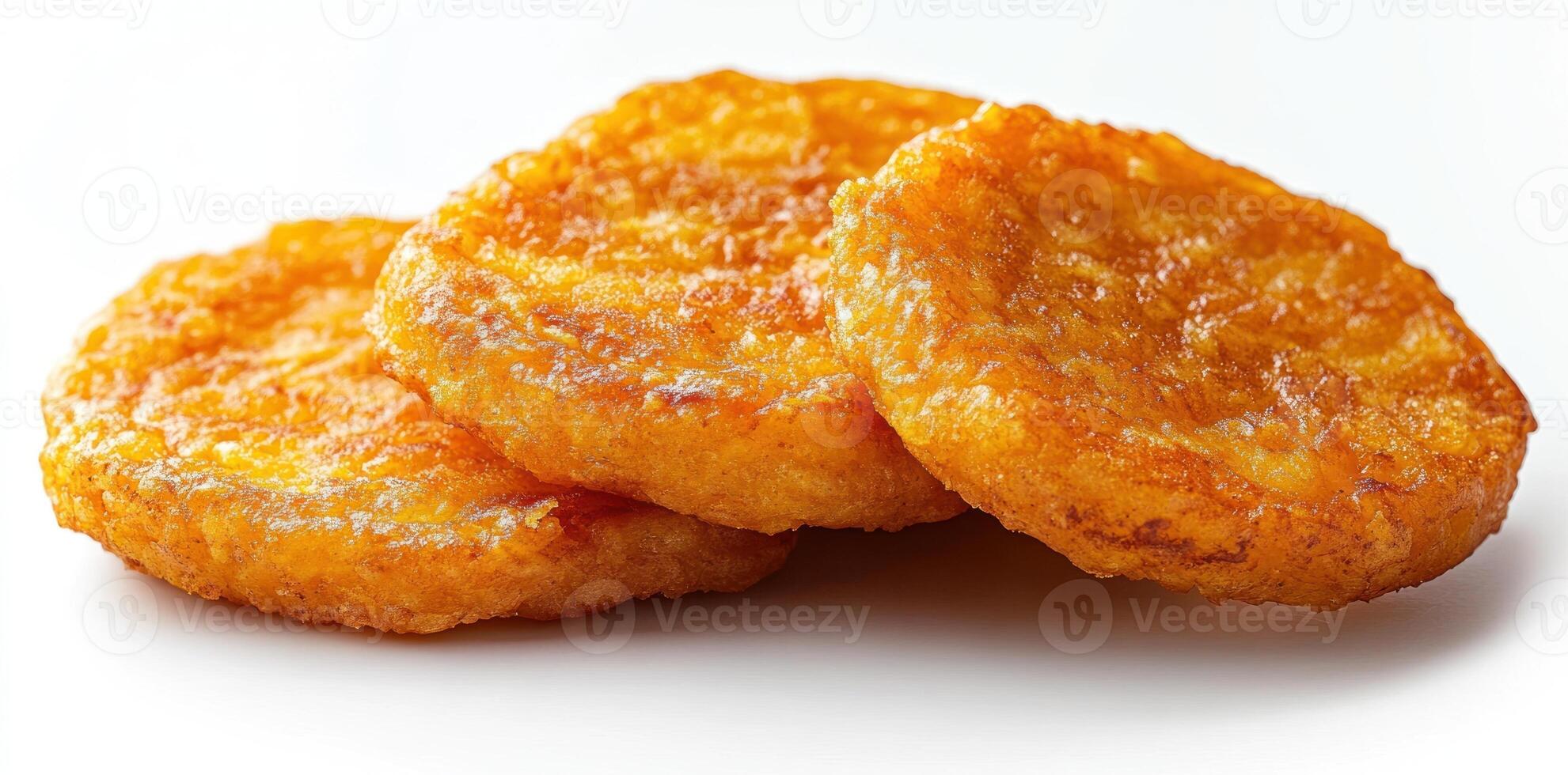 Three Golden Brown Fried Potato Cakes photo