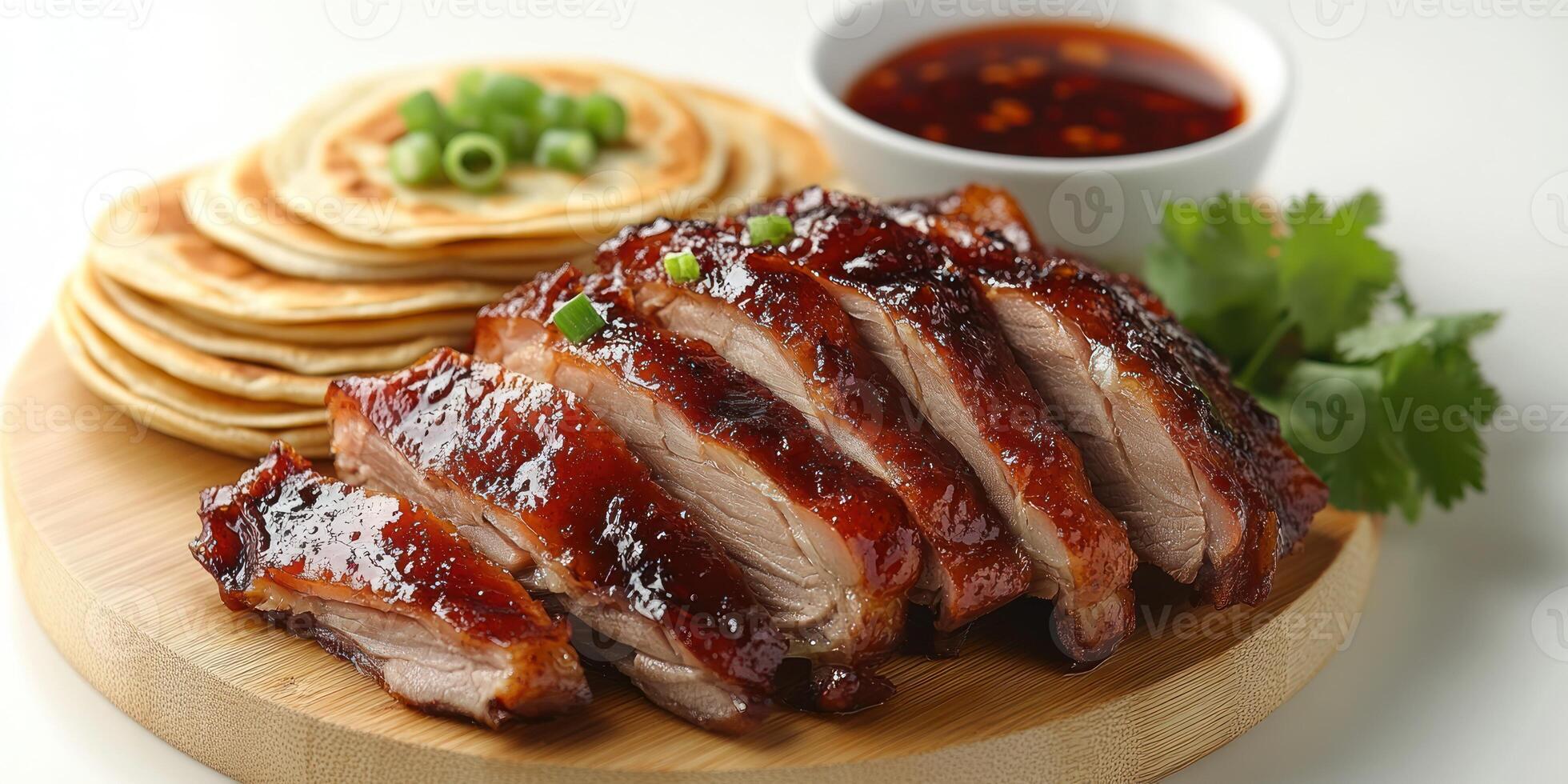 Roasted duck slices with pancakes, sauce, and cilantro photo