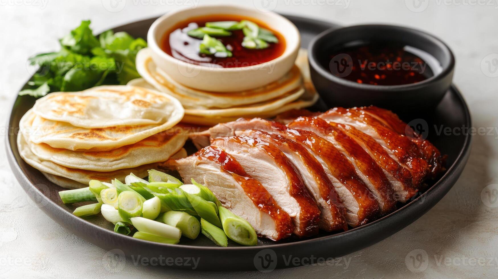 Crispy Roasted Duck with Pancakes, Green Onions, and Sauces photo
