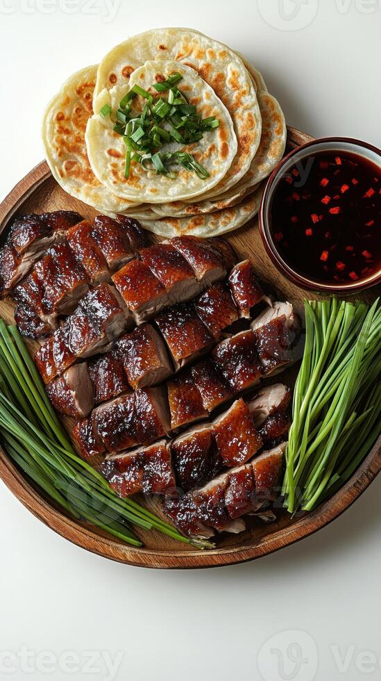 Roasted Duck with Pancakes, Green Onions, and Dipping Sauce photo