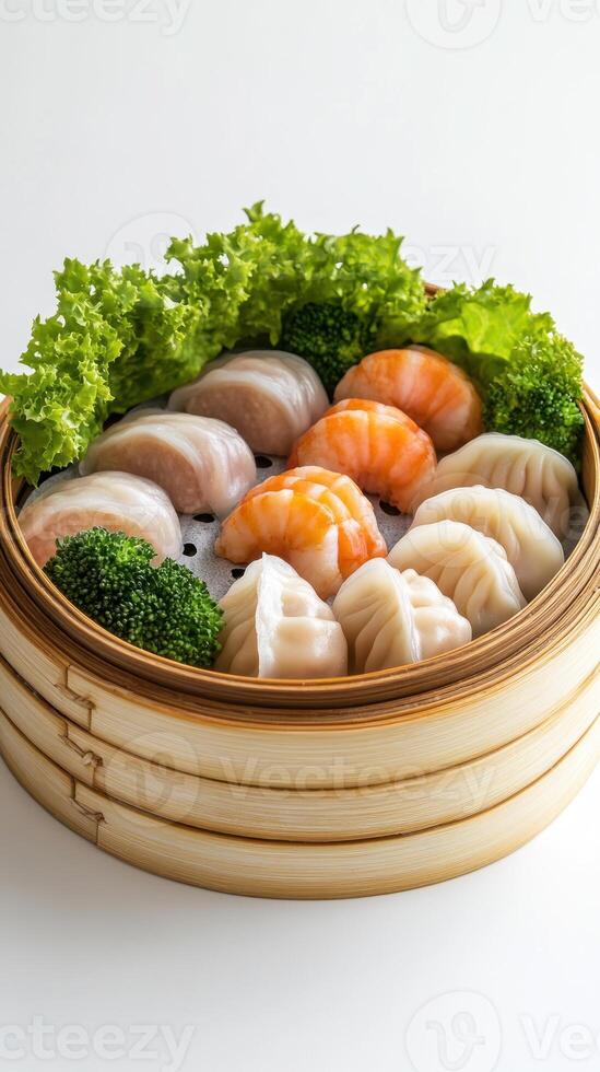 Steamed Dumplings with Shrimp and Pork Fillings in a Bamboo Steamer photo