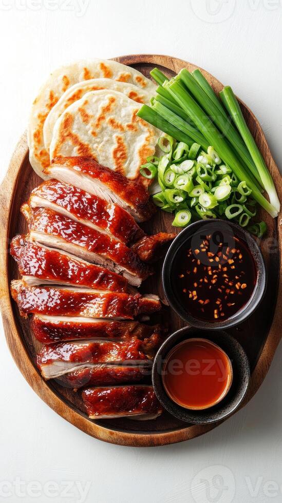 Peking Duck with Pancakes, Spring Onions, and Dipping Sauces photo