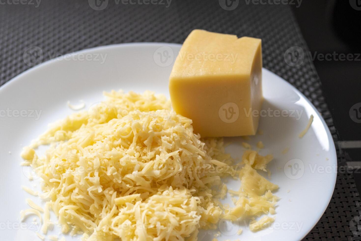 Close up shot of the grated cheese. Food photo