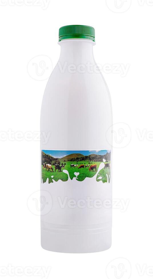 White plastic milk bottle with green cap showing cows grazing on field photo
