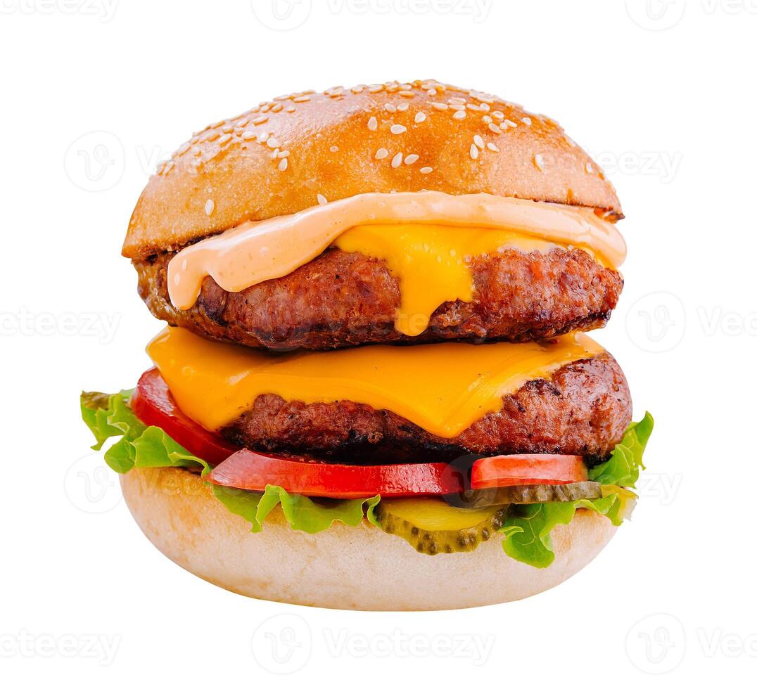 Delicious double beef burger with melted cheese and vegetables on white background photo