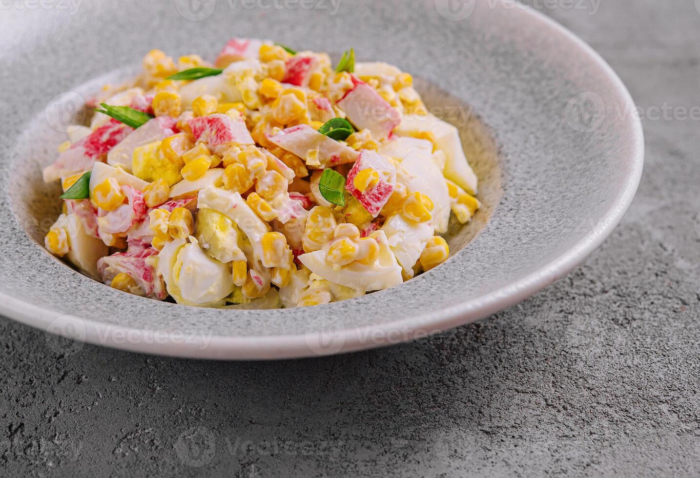 Colorful egg salad with sweetcorn and peppers photo