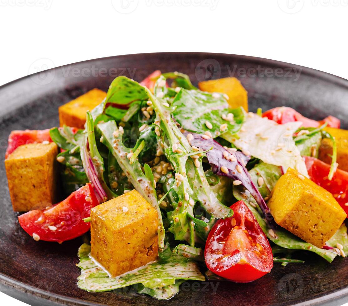 Fresh vegan salad with tofu and vegetables photo