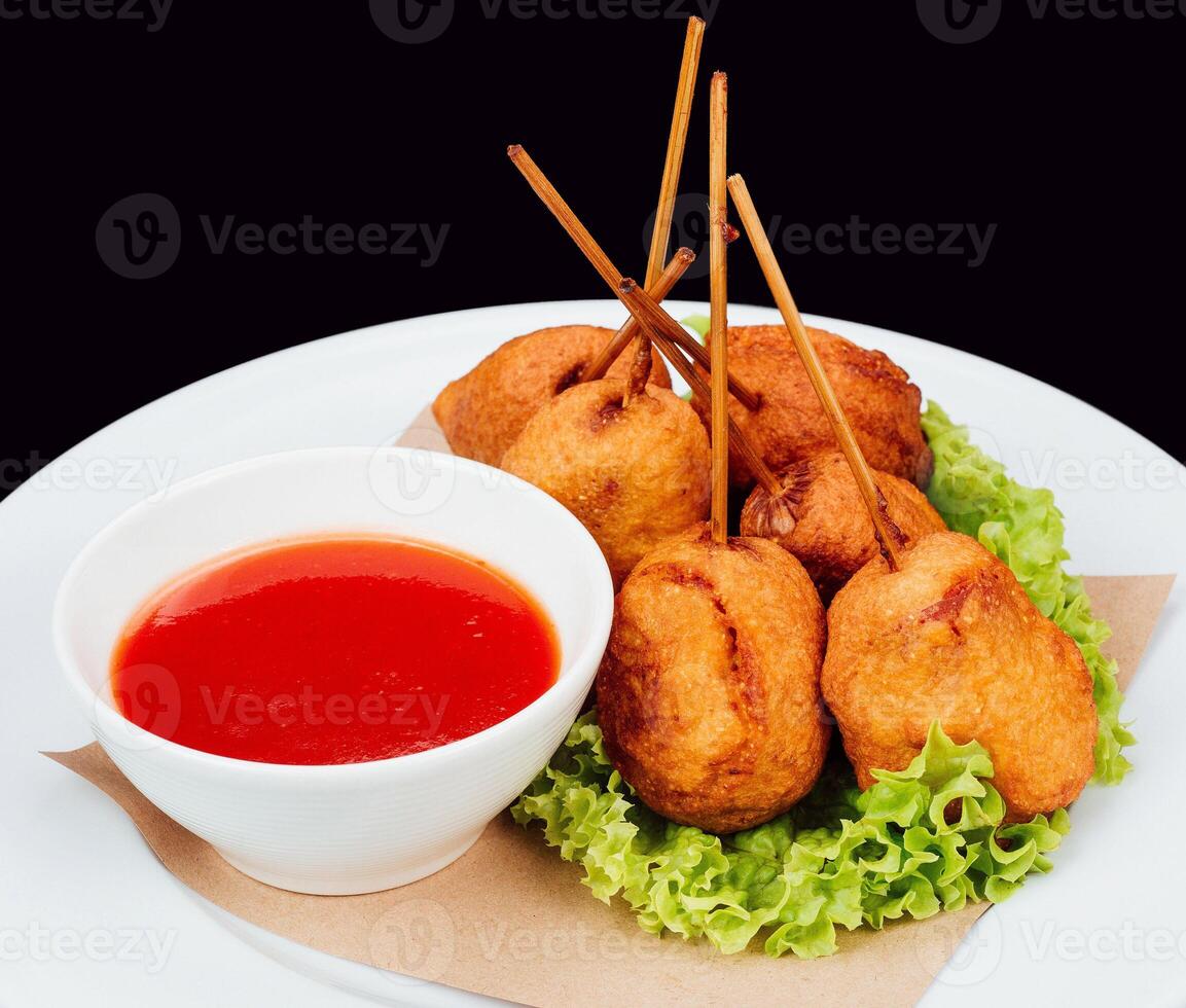 Delicious fried chicken bites with dipping sauce photo