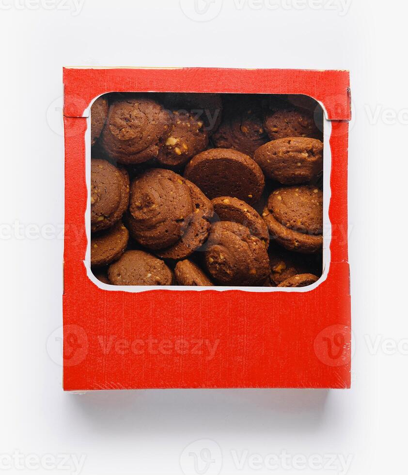 Box of homemade cookies isolated on white background photo