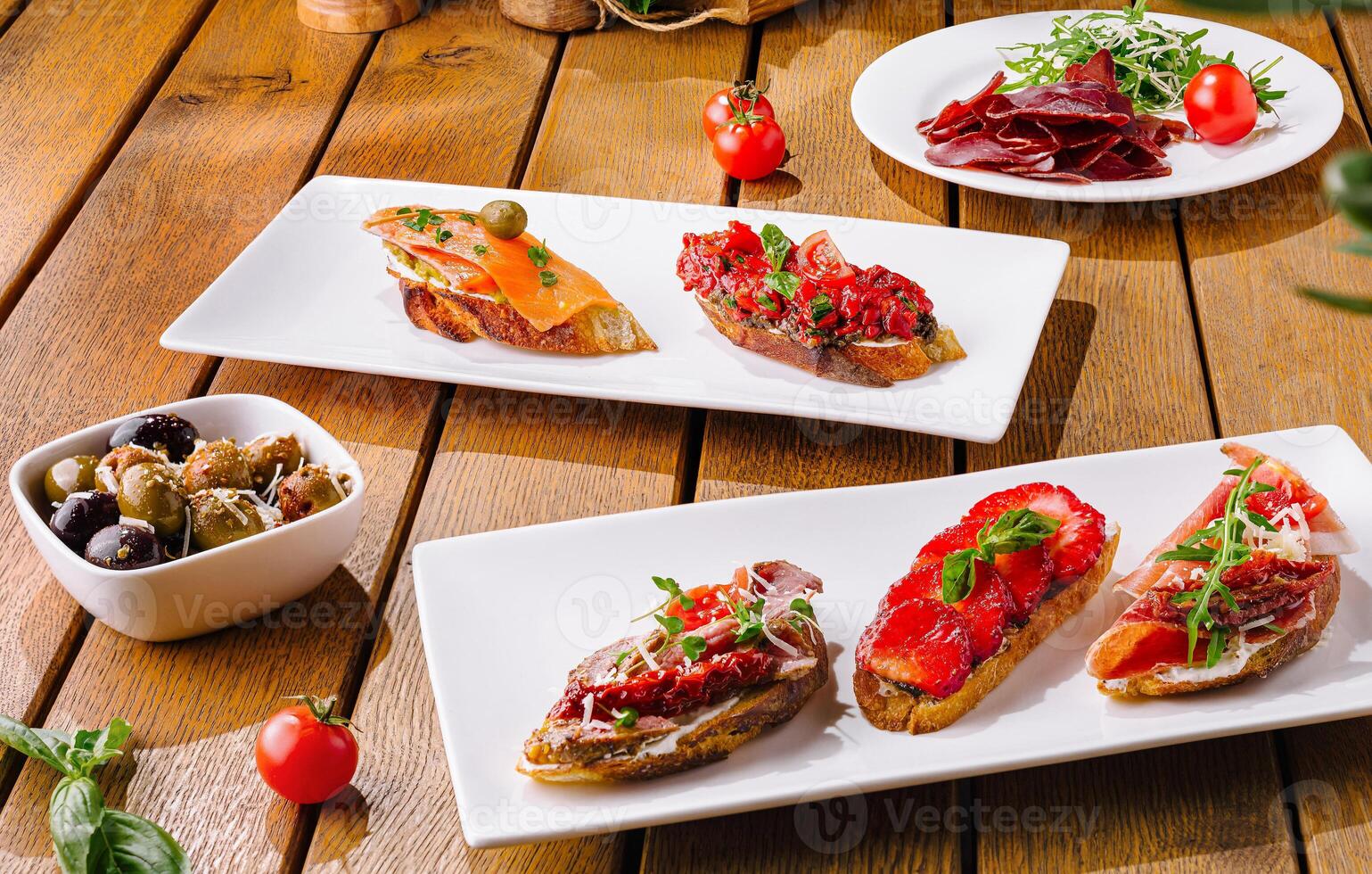Gourmet bruschetta assortment on wooden table photo