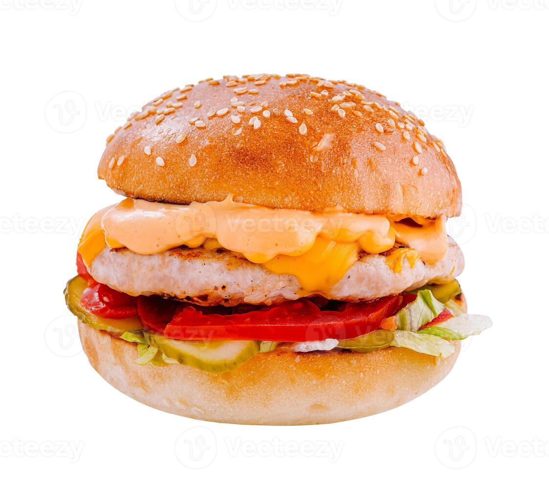 Delicious burger with chicken patty, vegetables and sauce on white background photo