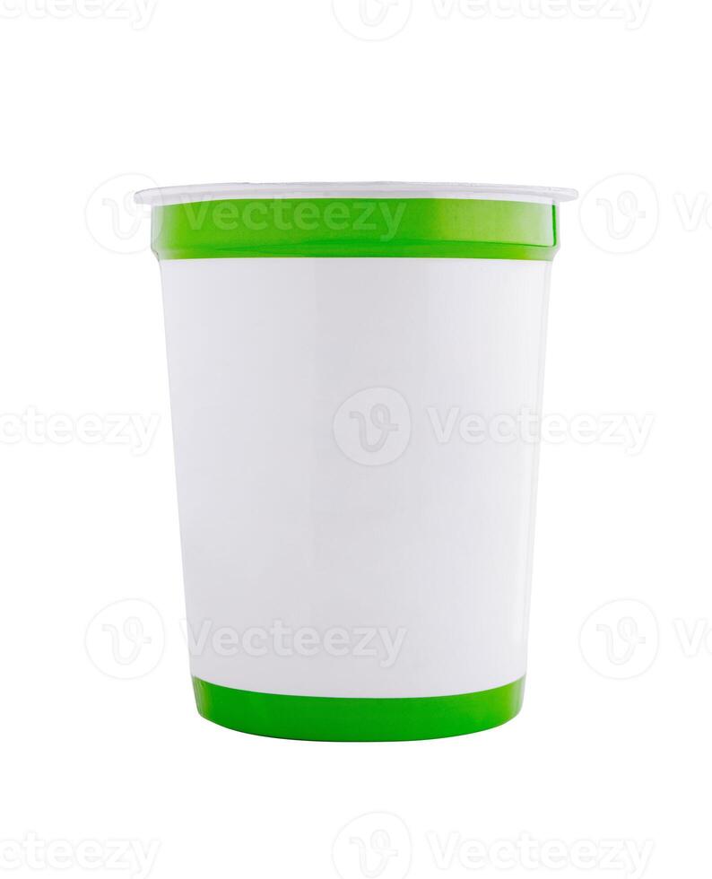 White plastic blank yogurt cup with green label standing photo