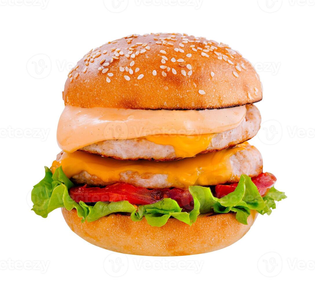Double burger with lettuce, tomato, cheese and sauce on white background photo