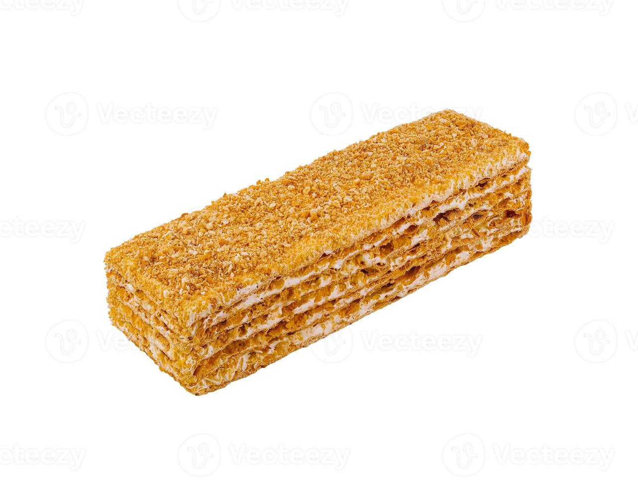 Honey cake is sitting on a white background photo