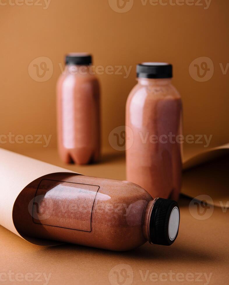 Chocolate protein shake in bottles with blank labels for mockup on brown background photo