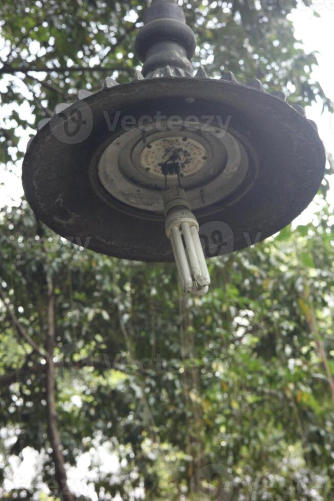 Broken park lamp need to be fixed photo