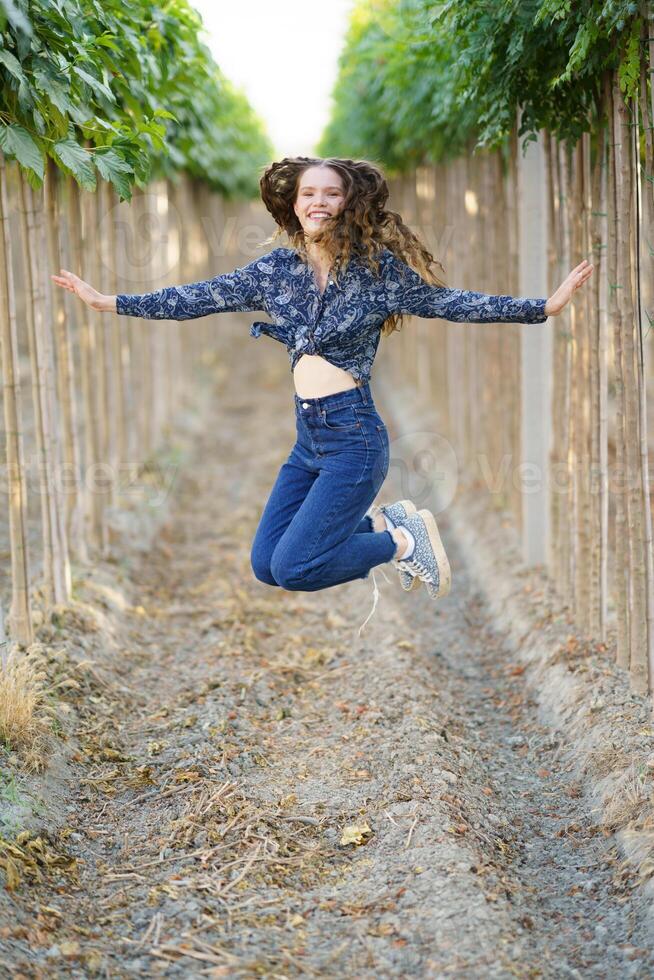 Experience the Joyful Jump in the Vineyard A Celebration of Nature and True Freedom photo