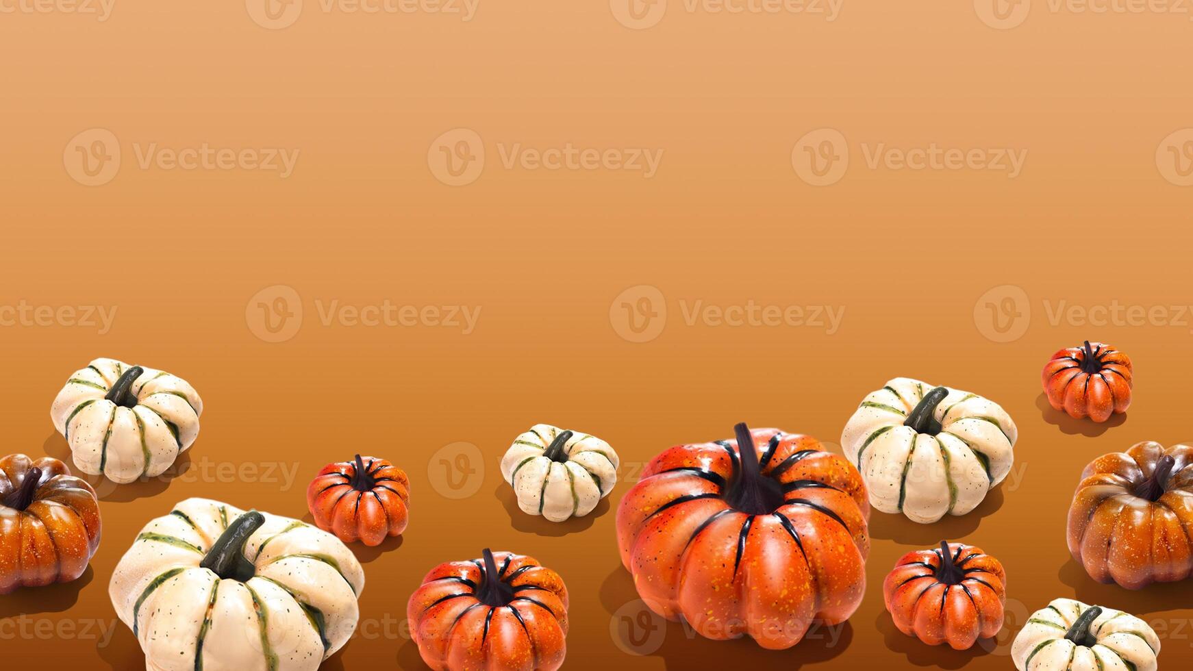 Orange and white pumpkins on orange yellow gradient background banner minimal copy space photo