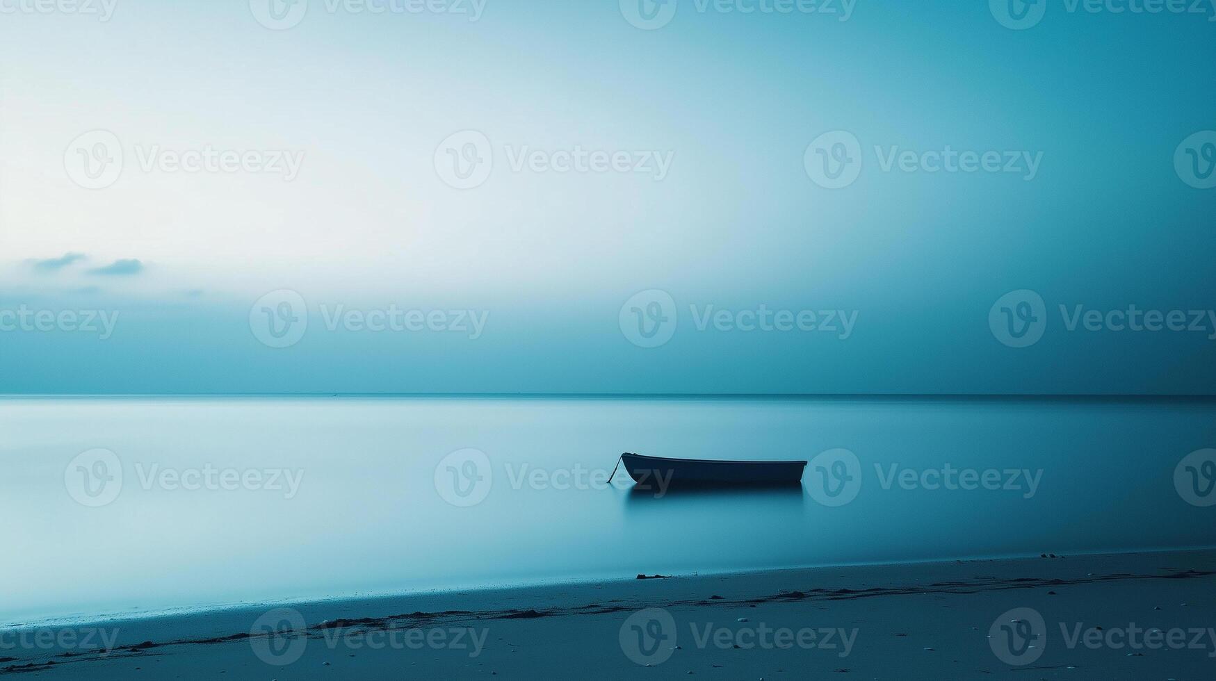 A photo of a beach at dawn, where the entire scene is tinted in shades of blue. The only element in the photo is a small boat anchored in the distance