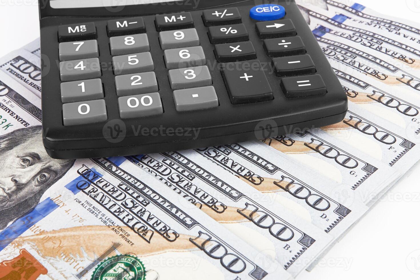 hundred dollars on white photo