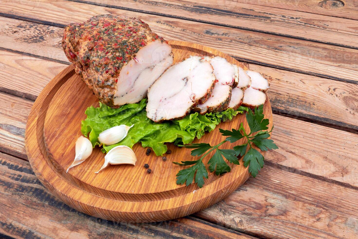 Baked meat on wooden surface photo