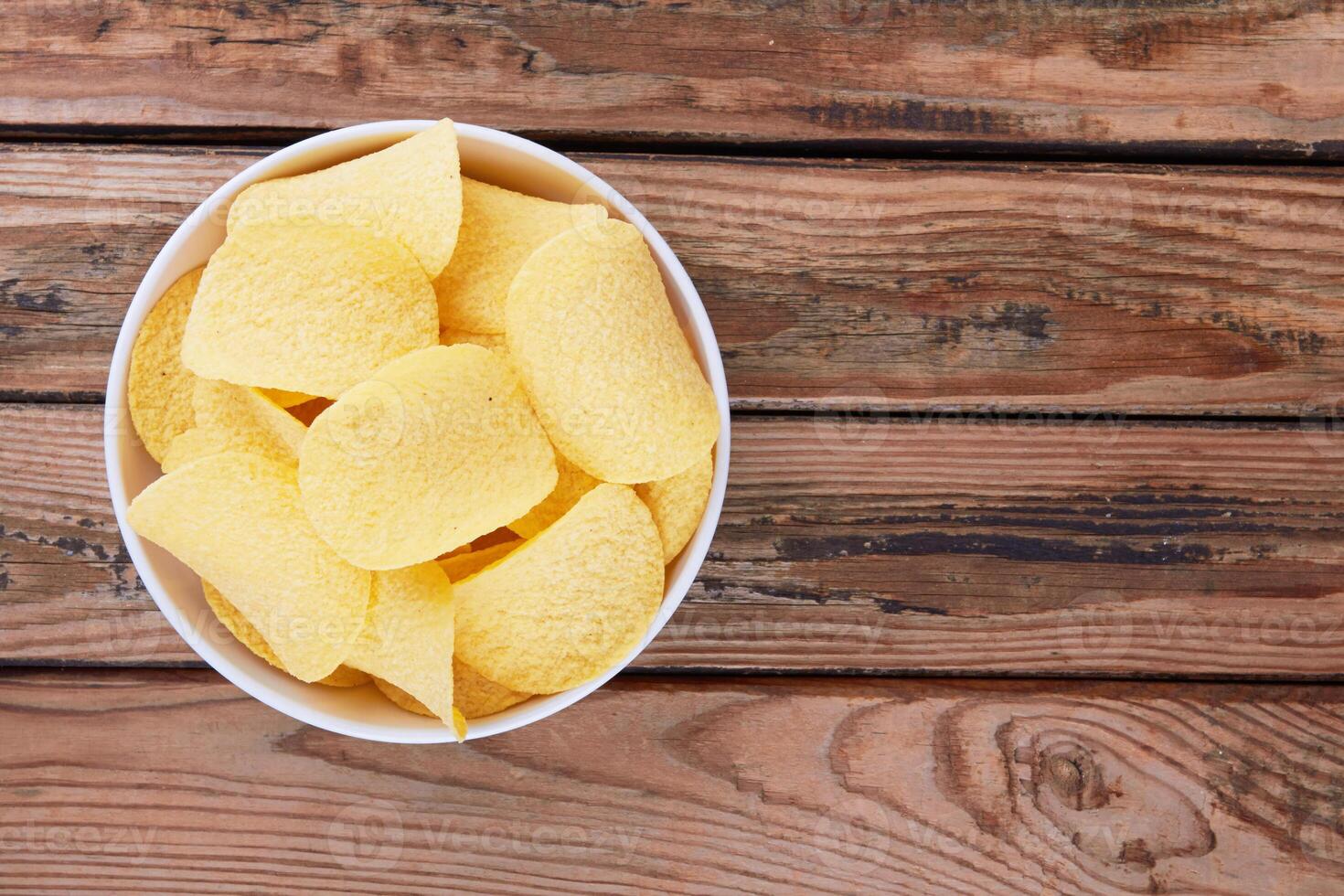 Potato chips in a saucer photo