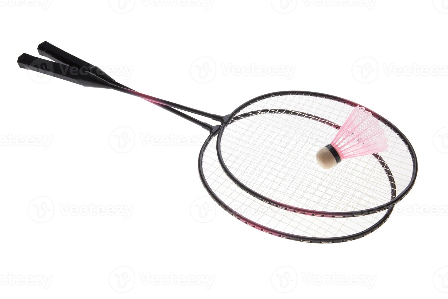 Badminton rackets on white photo
