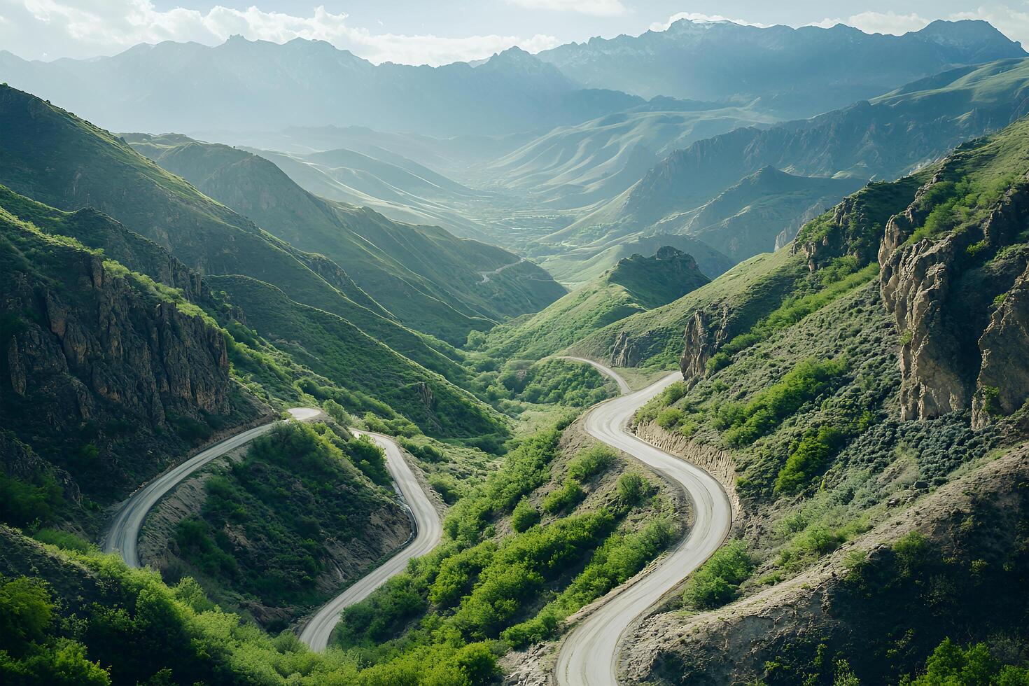 Twisting Mountain Road with Sharp Hairpin Curves and Breathtaking Valley Views, Framed by a Clean White Background photo