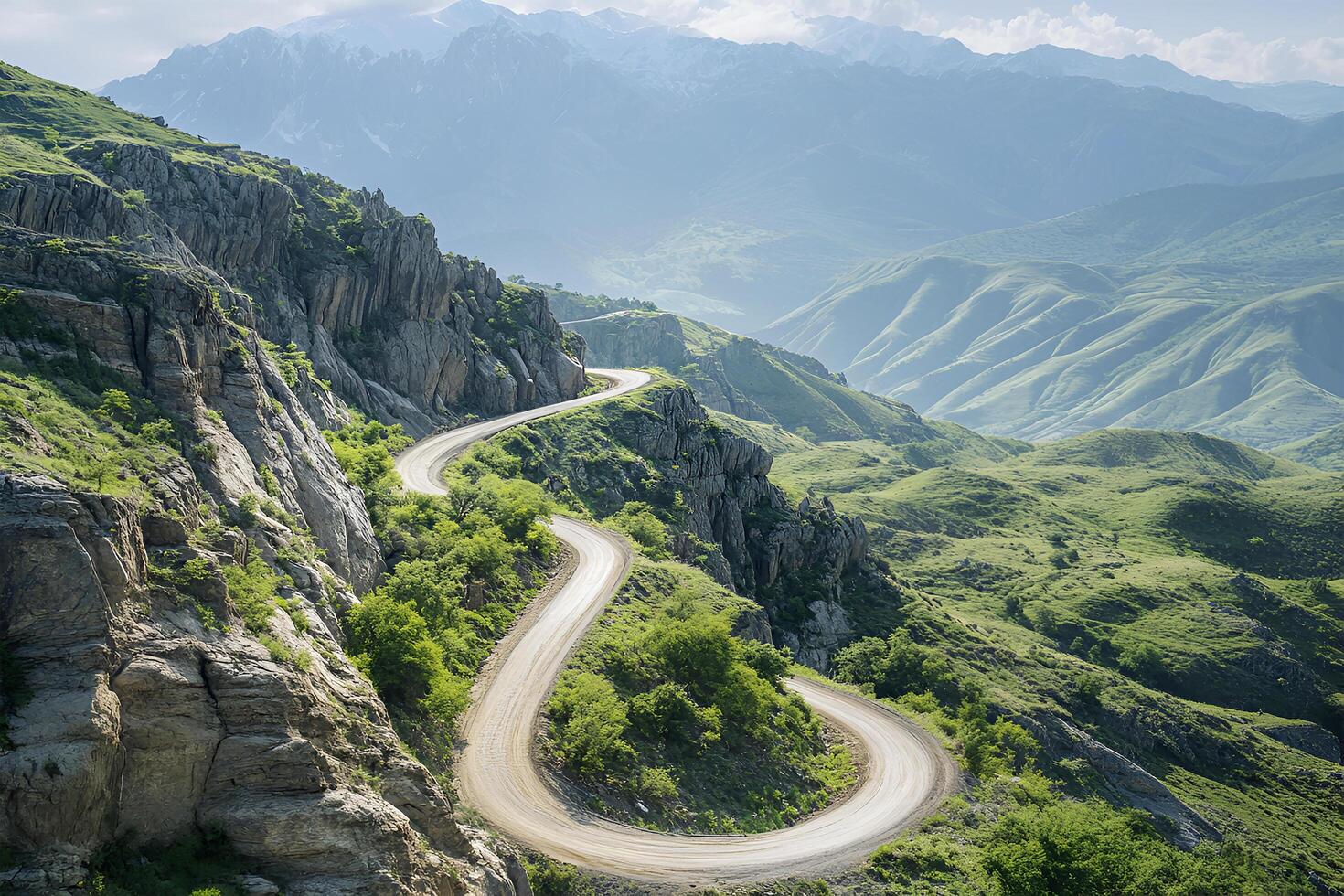 Twisting Mountain Road with Sharp Hairpin Curves and Breathtaking Valley Views, Framed by a Clean White Background photo