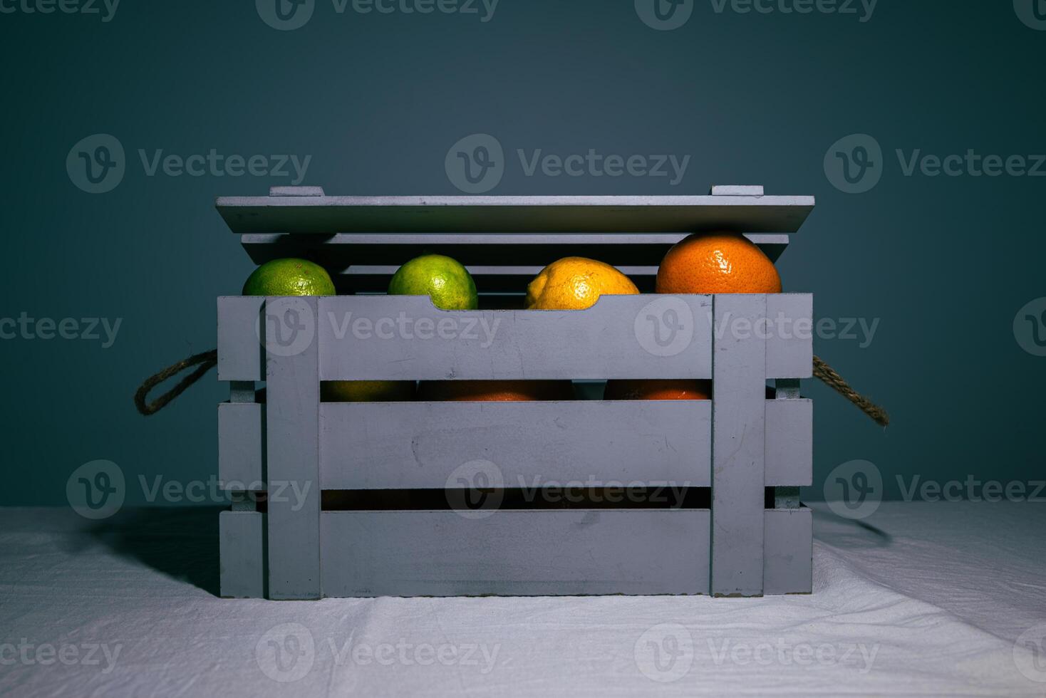 Citrus Fruits in Wooden Crate photo