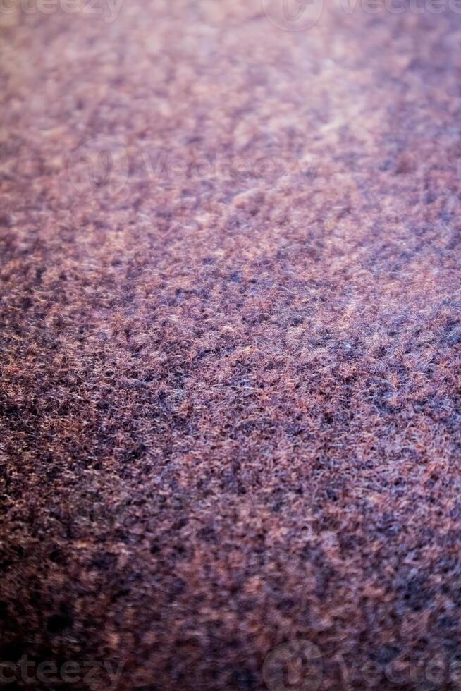 Close-up textured carpet background, red carpet photo