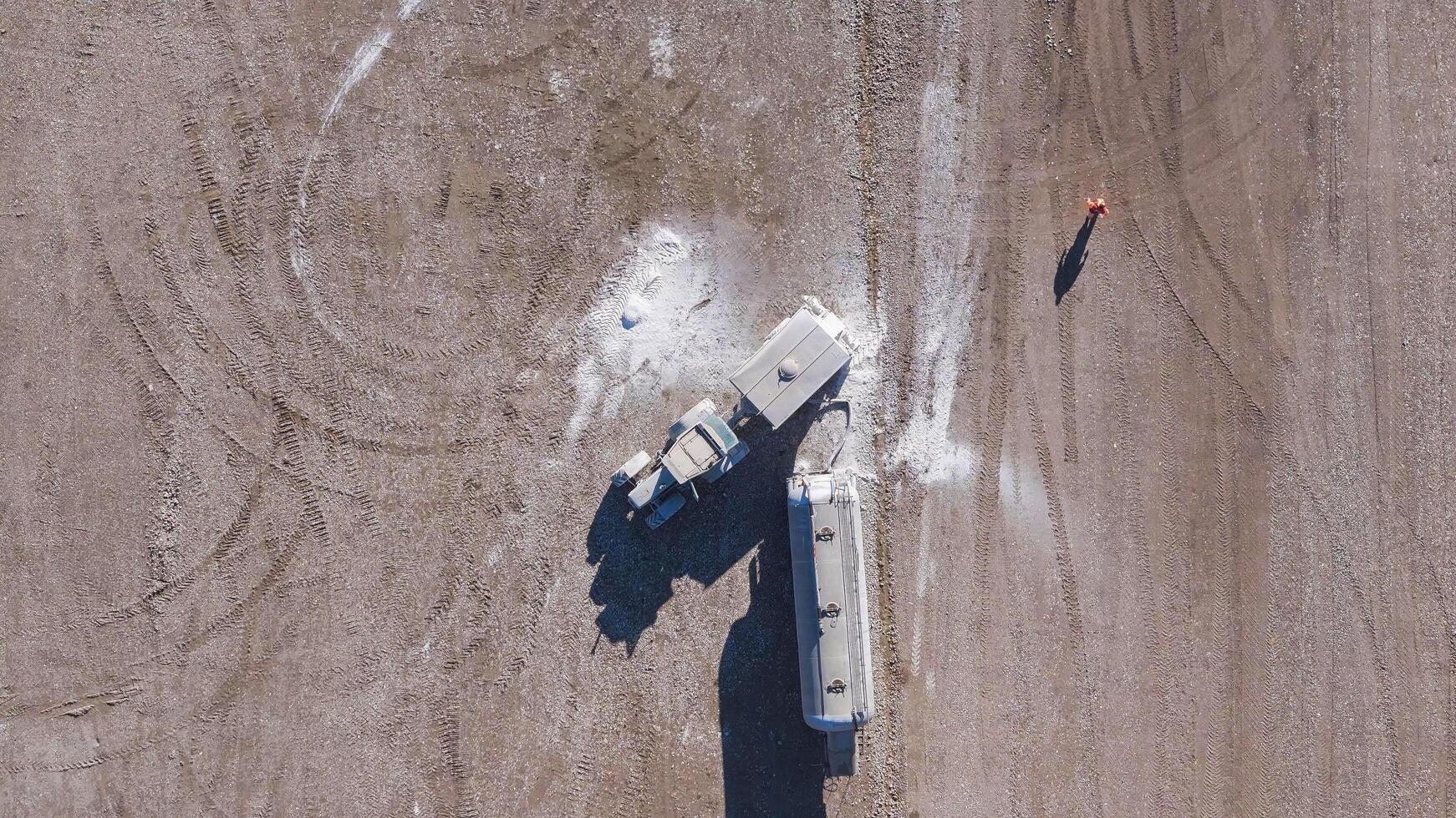 Earthmoving equipment. Aerial view of a large construction site with several earthmoving machines. photo
