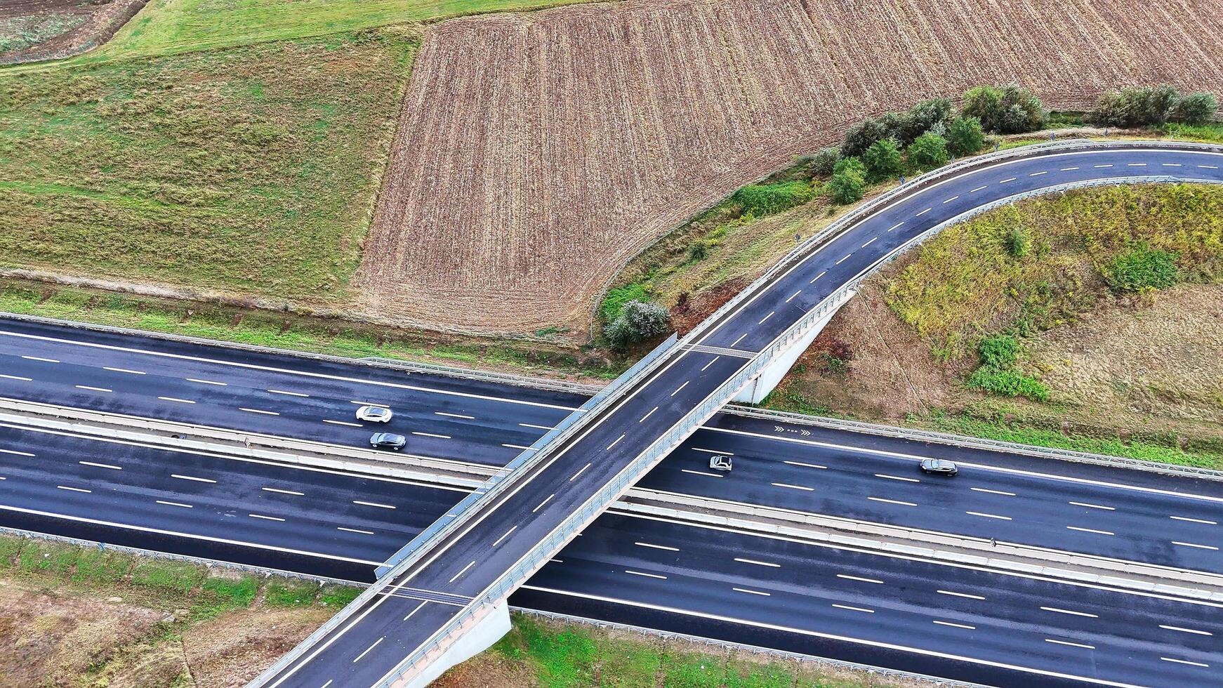 Arial view of Modern transportation with Expressway Road highway Top view. Important infrastructure. photo