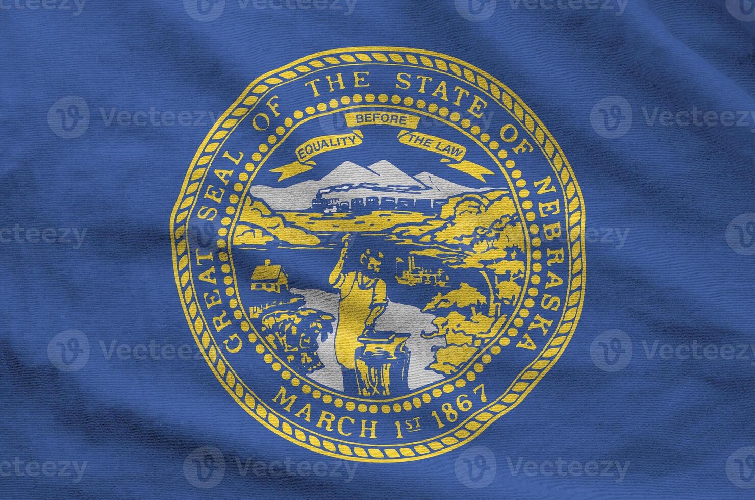 Nebraska US state flag depicted on folded wavy fabric of old cloth photo