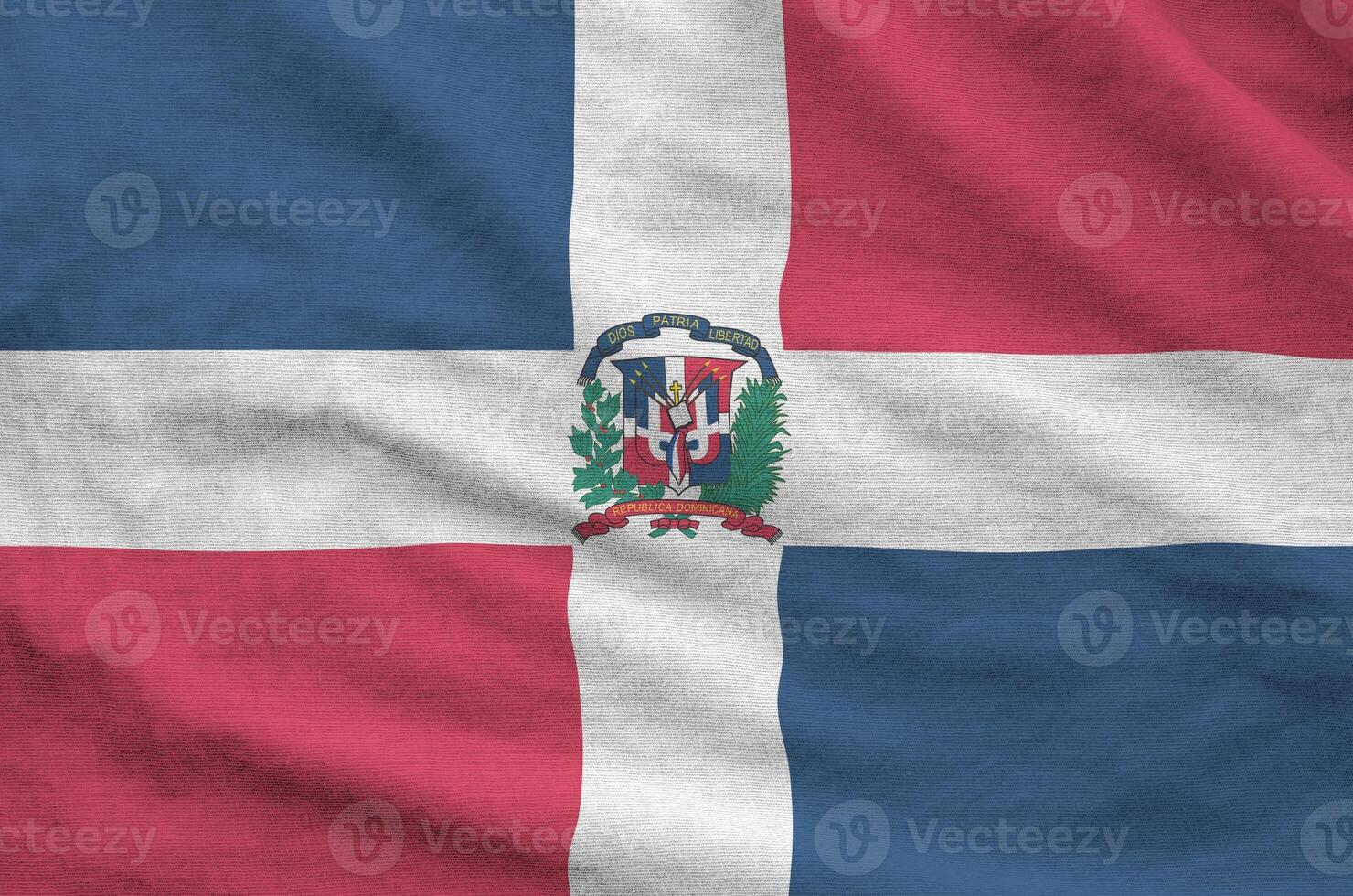 Dominican Republic flag depicted on folded wavy fabric of old cloth photo