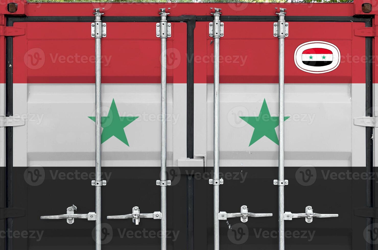 Syria flag depicted on metal doors of shipping cargo container outdoors in docks area photo