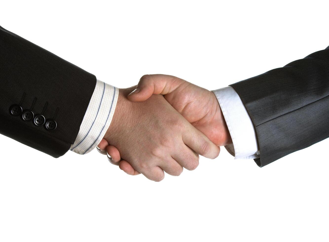 signing of the agreement and a handshake photo