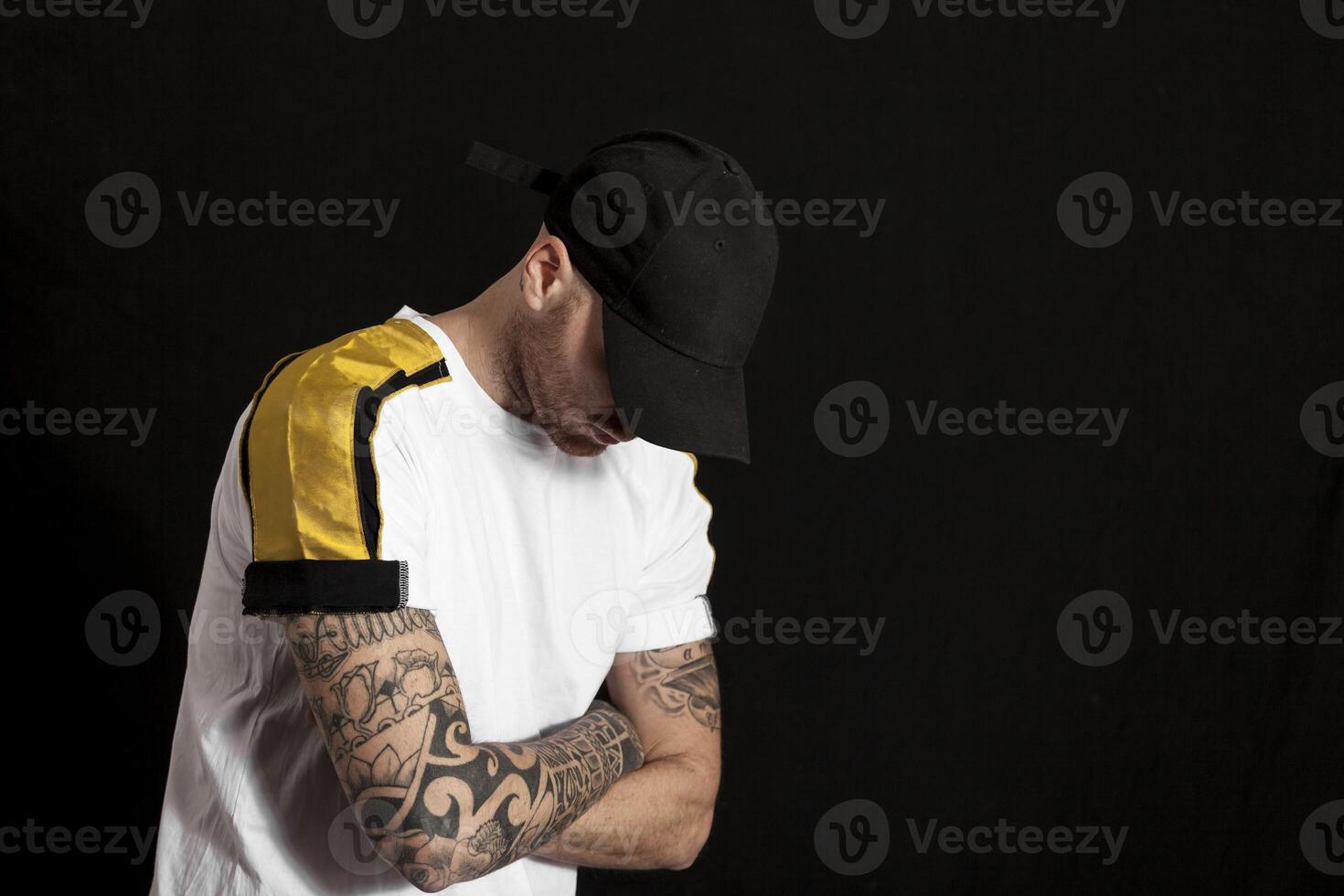 portrait of young rapper in the studio photo